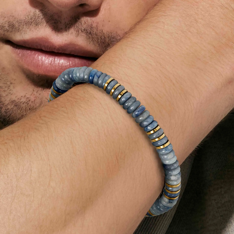 Armband Instinctstyle Infinity in PVD in mit hellblauen farbigen Steinen